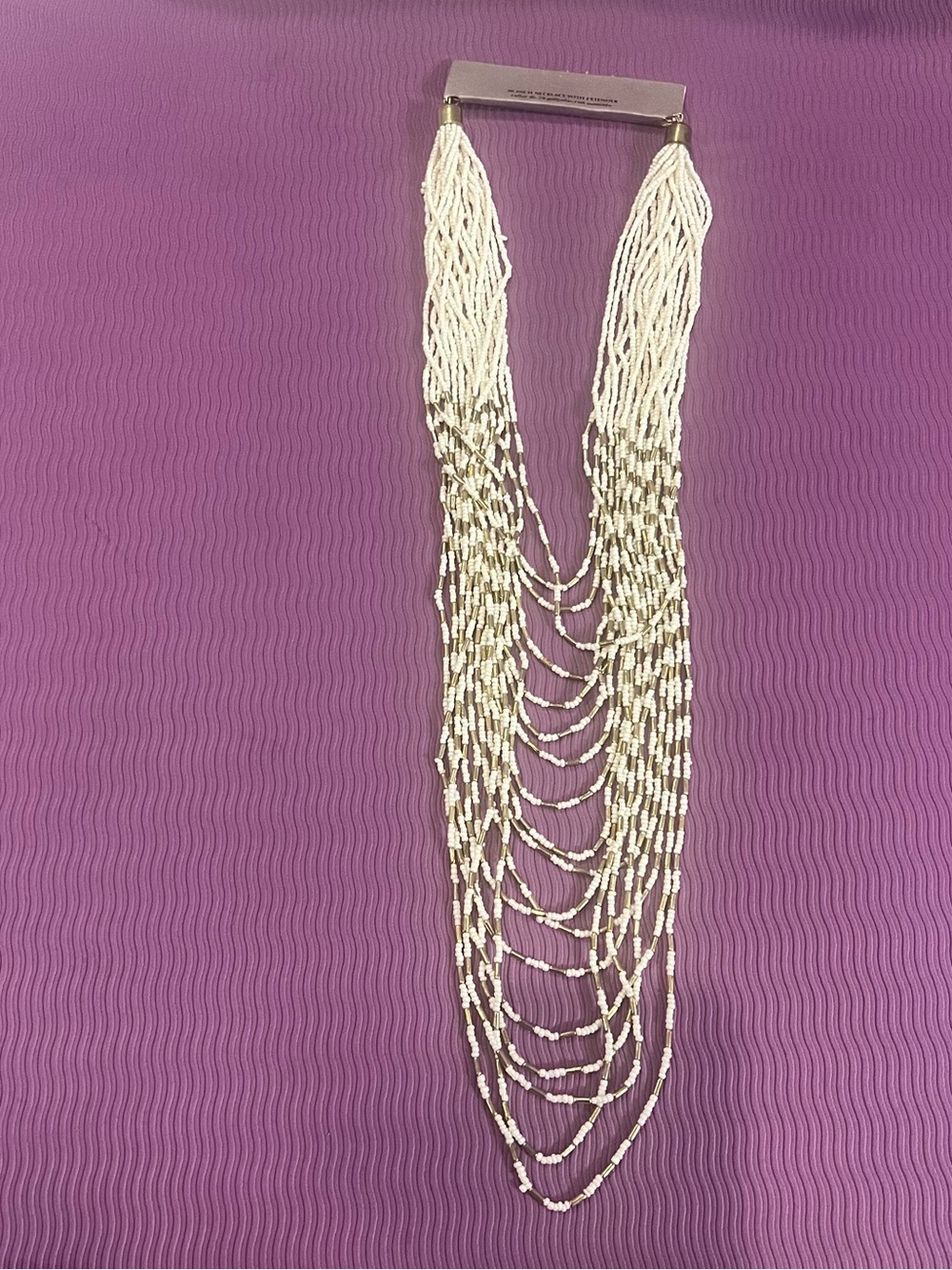 Elegant Ivory and Gold Multi-Strand Beaded Necklace